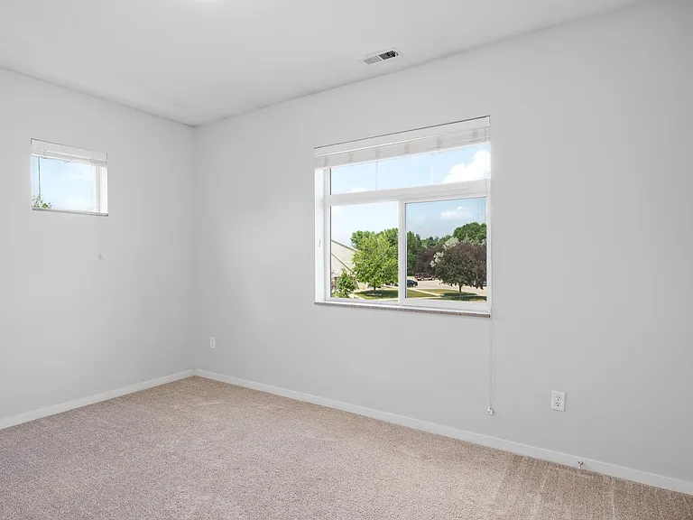 Bright and spacious room with large window offering lush green views, ideal for a serene living experience. Bright and spacious room with large window offering lush green views, ideal for a serene living experience.