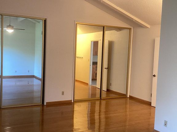Spacious Master Bedroom with 2 mirrored-door closets and room for small sitting area/desk area. All 3 bedrooms have mirrored closet doors.