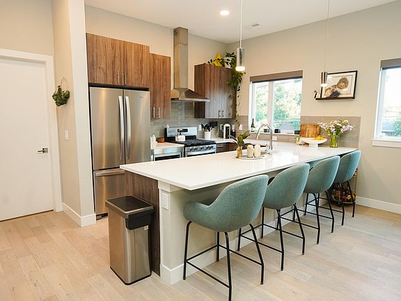 Kitchen with high-end stainless steel appliances and plenty of storage