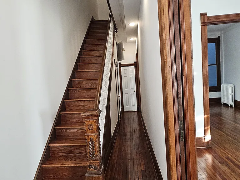 1st floor, foyer and stairs to 2nd floor.