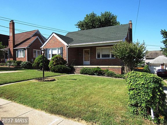 Landscaped front yard with sidewalks