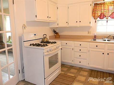 Large, Bright Kitchen with New Stove