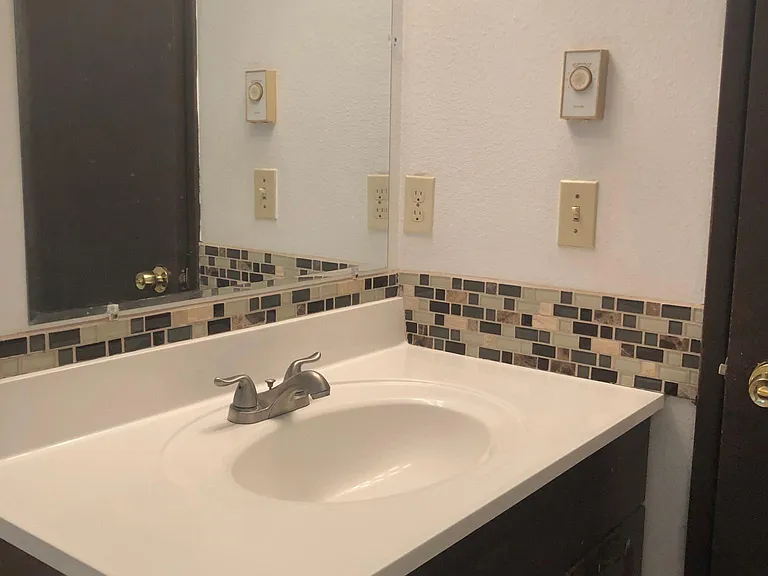 2nd bathroom with sink, toilet, shower