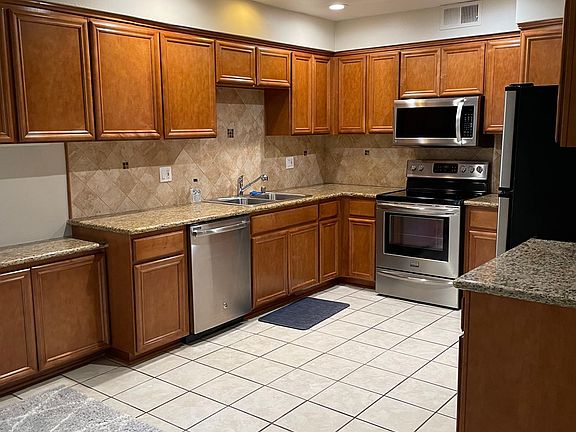 New kitchen with all ss appliances -refrigerator, stove, dishwasher & microwave