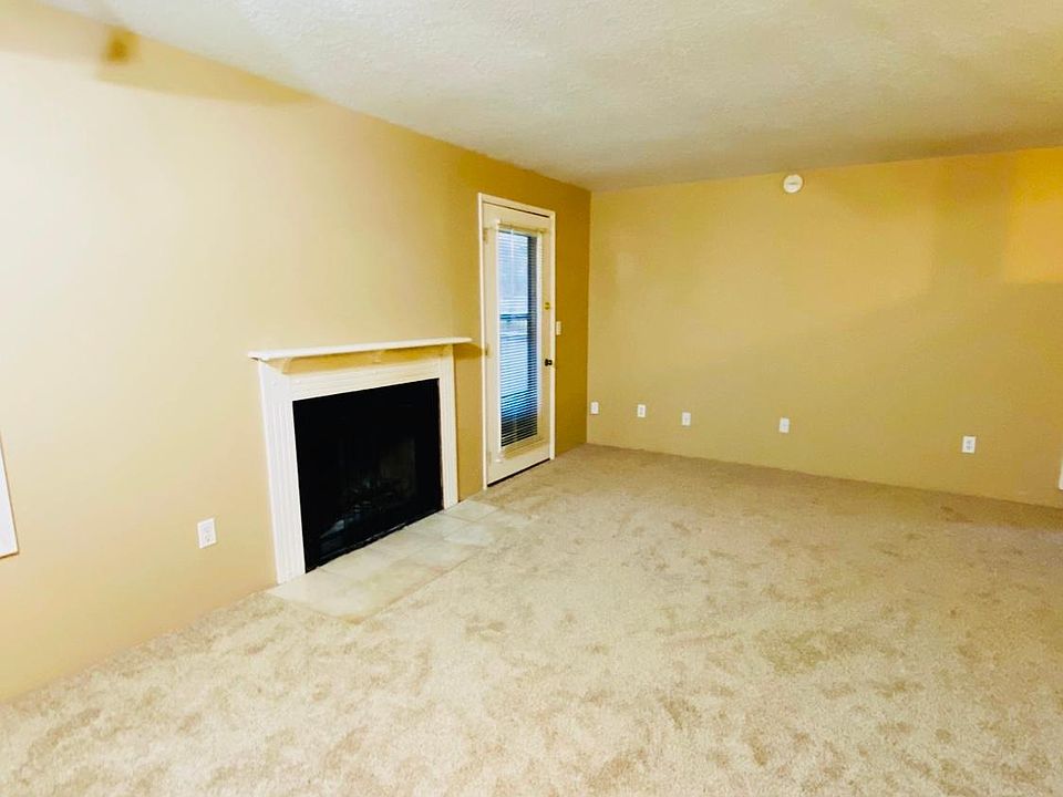 Spacious living room with fireplace