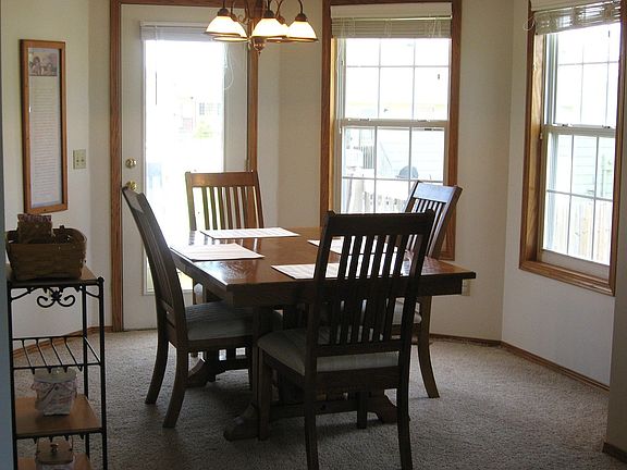 Inviting Dining Room w/ Access to Deck