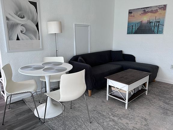 5th image of 7445 Harding Ave APT 211