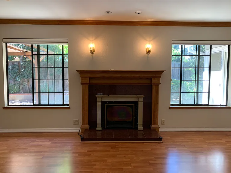Bright living room with two large picture windows