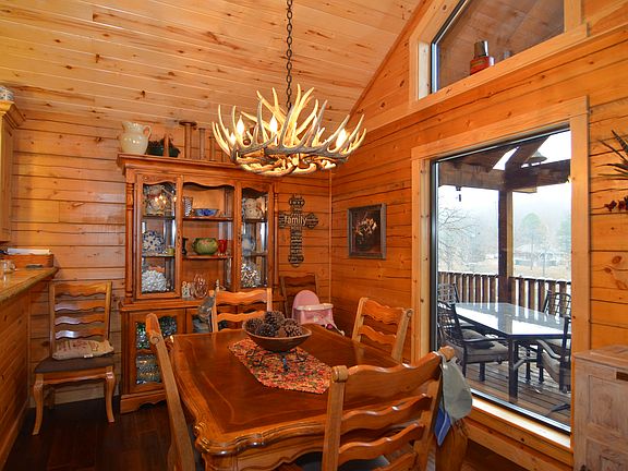 Dining area with unique chandelier