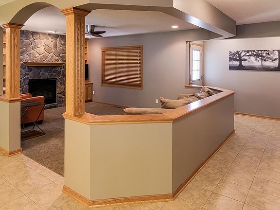 Wide tiled entry looks onto the Living room.  A coat closet and powder room are conveniently located off the entry.