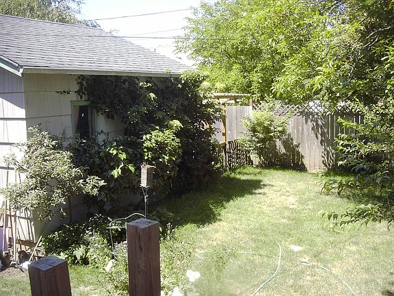 back yard with garage