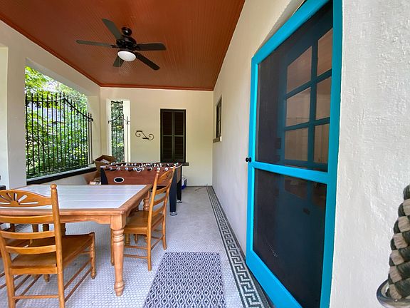Front porch and door to the apartment.