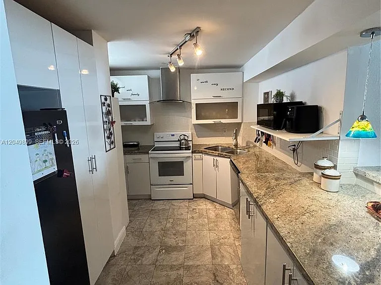 6450 Collins Ave #1207 — Photo 1