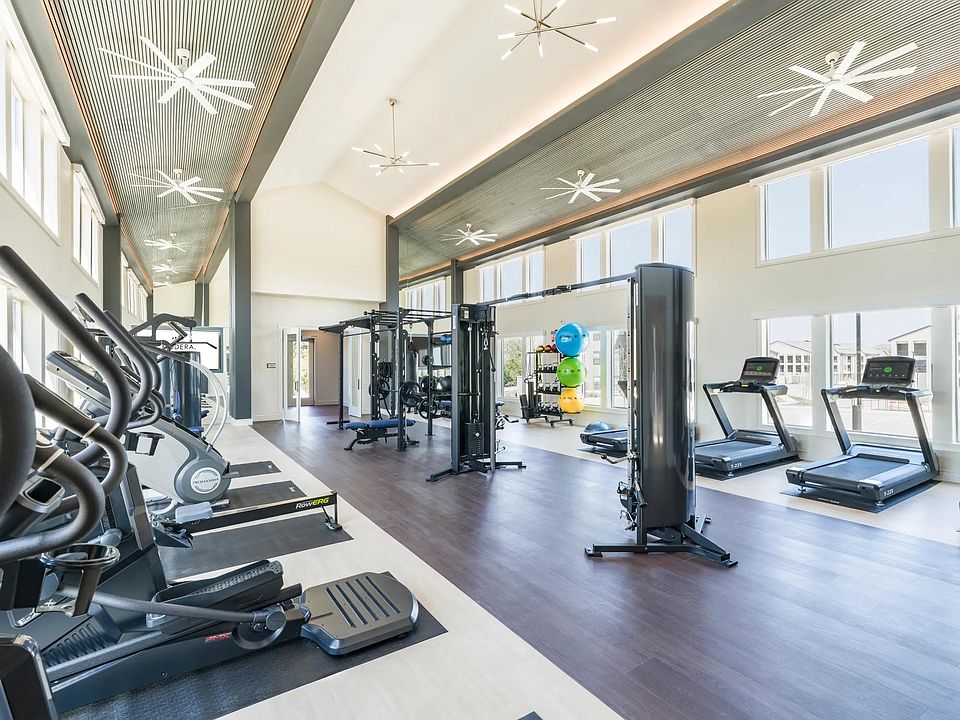 Premium Fitness Studio featuring cardio equipment, free-weights, state of the art equipment, including boxing zone and spin bikes.