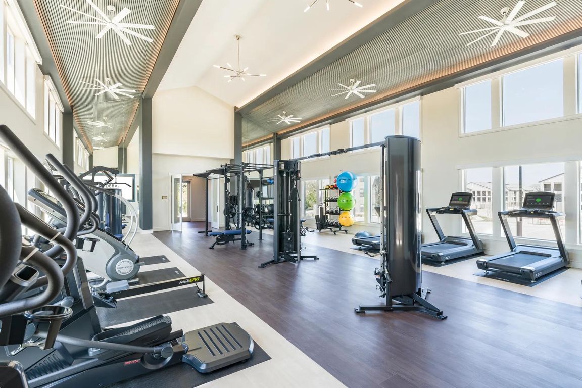 Premium Fitness Studio featuring cardio equipment, free-weights, state of the art equipment, including boxing zone and spin bikes.