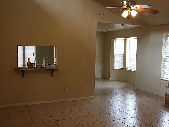 View from den to kitchen and breakfast room.