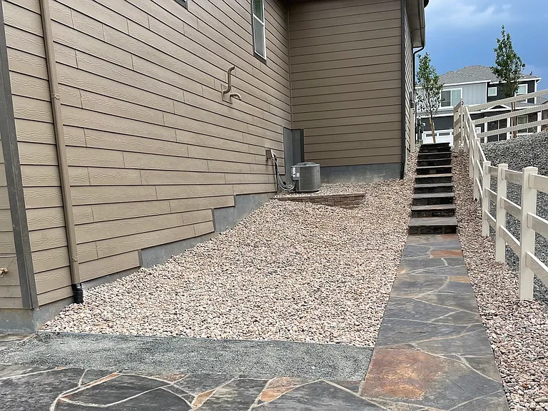 Steps on the side of the house, view from the back