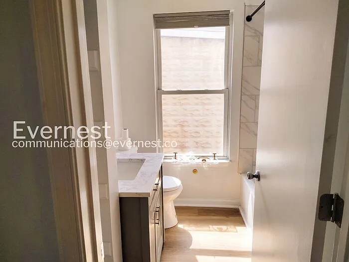 217 E 5th St — Photo 12