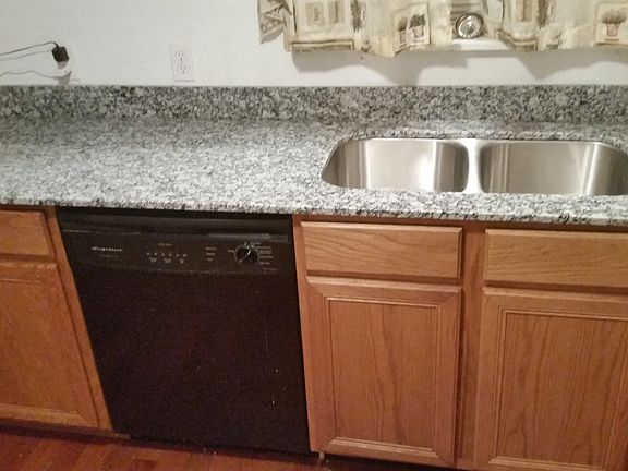 new granite and cabinets