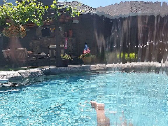 From pool facing house