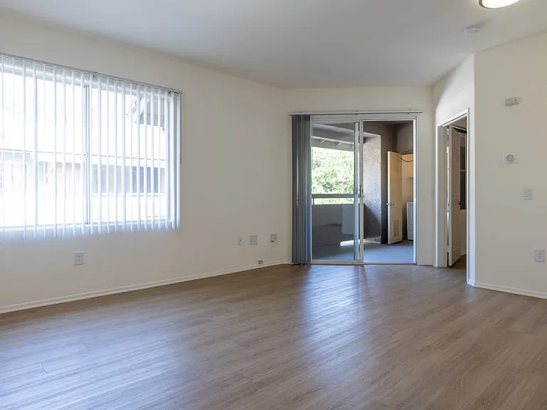 Living Room with Balcony and Hard Surface Flooring
