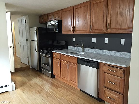 New eat-in-kitchen with granite countertops and stainless st
