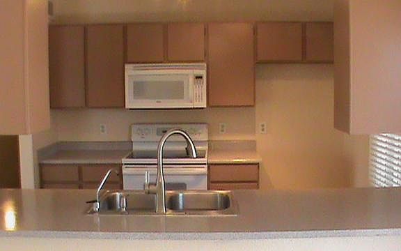 Refinished counter tops and cabinets (inside and out) in December. Sink and plumbing fixtures new in December. Use your refrigerator or we will furnish one. R.O. water dispenser is optional - will remove if you'd rather have the cabinet space. We main