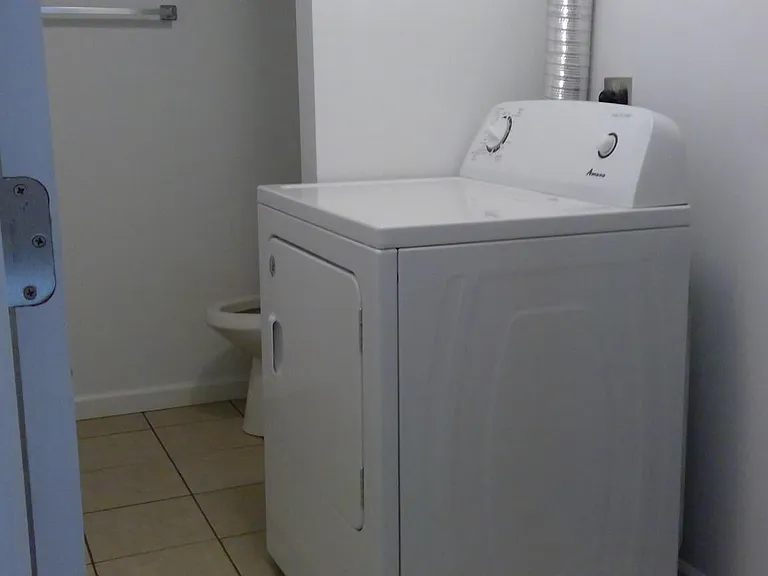 Dryer and half bath.