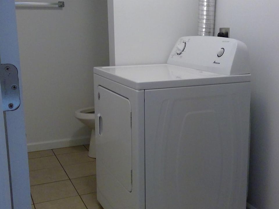 Dryer and half bath.