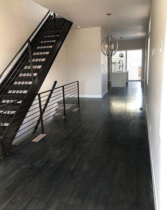 Living, Dining, & Kitchen through back door.