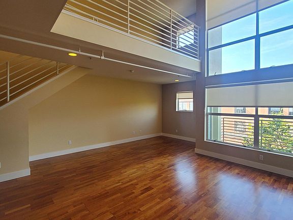 STUNNING LOFT W/ NEW ROLLER SHADES AND REFINISHED HARDWOOD FLOORS