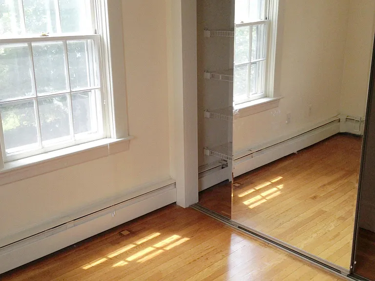 Bedroom and sliding mirrored closets