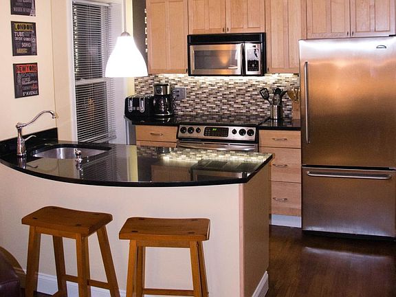 Stainless steel appliances and granite countertops