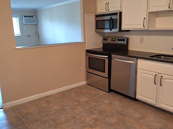 Breakfast bar open to kitchen