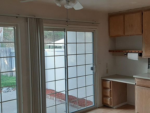 View of covered patio from kitchen, breakfast nook