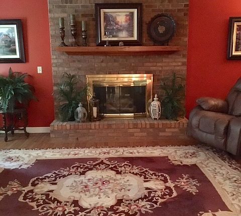 Den with gas fireplace