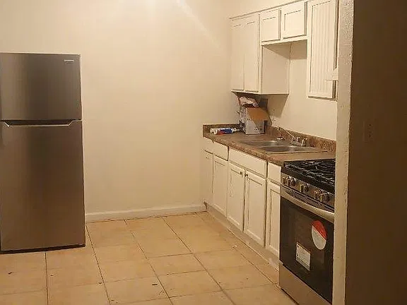 Apartment kitchen — apartment 2 at 3245 West Jefferson Apartments.