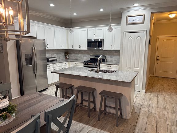From dining area looking back into Kitchen
