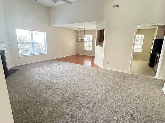 Living Room/ formal dinings room and kitchen view