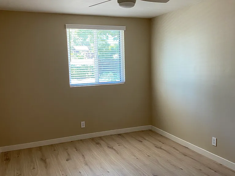Bedroom 1
Spacious / Nice street view window with wood slat blind for privacy