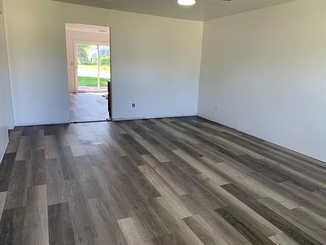 Living room looking into kitchen