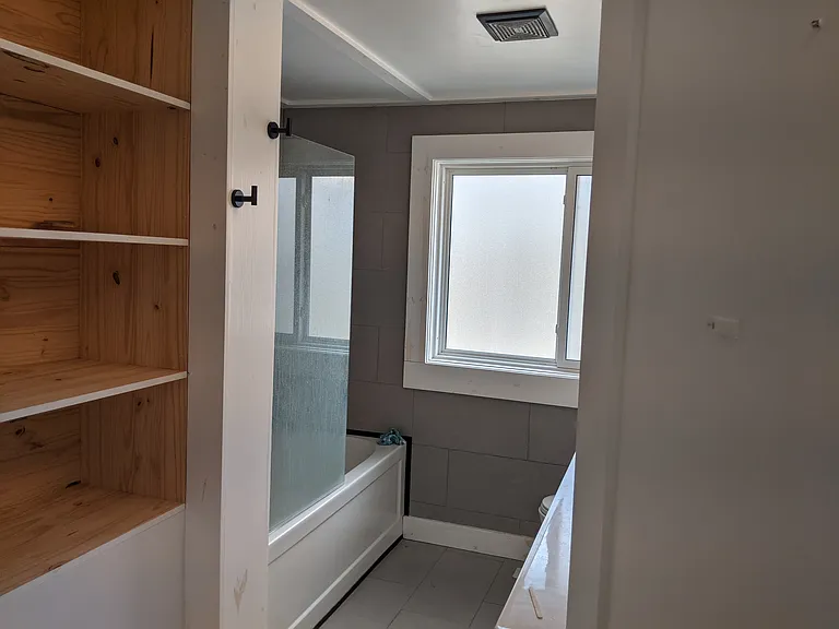Bathroom is a four piece with shower and tub.