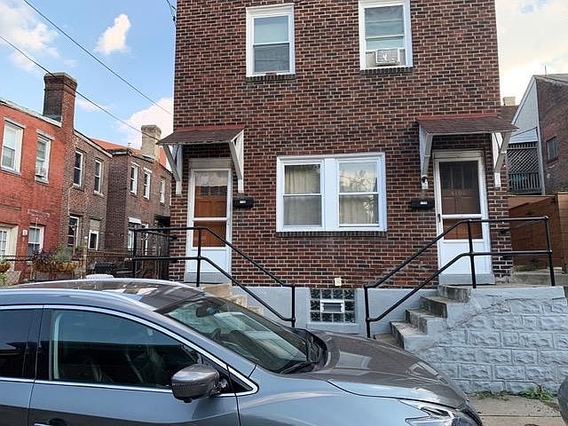 Exterior of house. Entrance is on the LEFT. Separate entrances from 2nd floor tenant whose entrance is on the RIGHT.