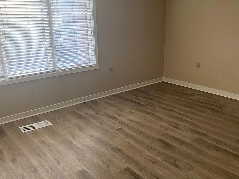Large, sunny master bedroom