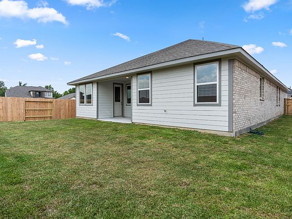 Come and see this spacious backyard with its beautiful covered patio. There is plenty of room for t
