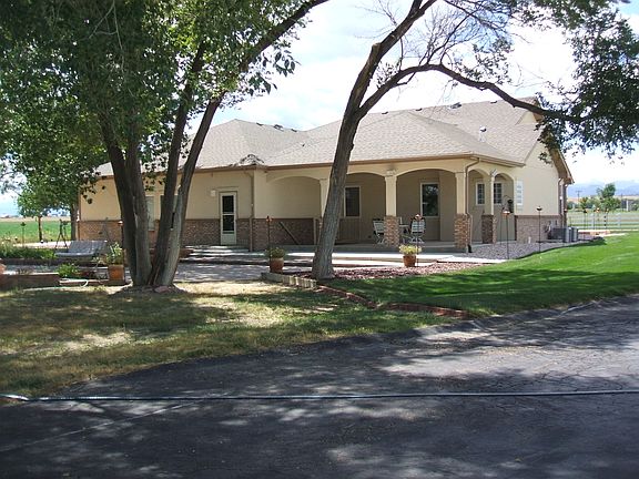 E.side showing cov.porch