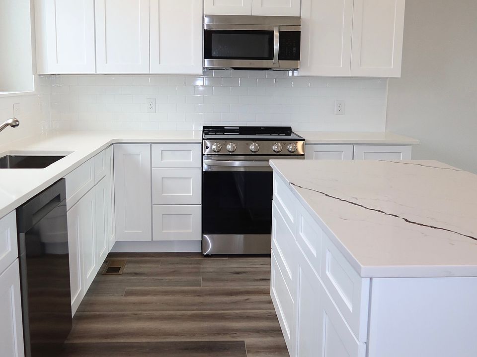 1st image of 11948 W 57th Pl