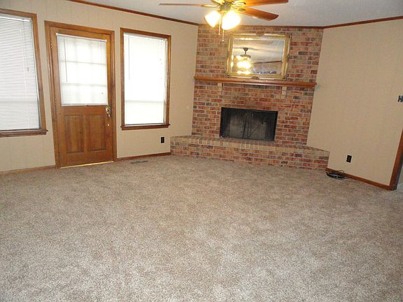 Den with fireplace