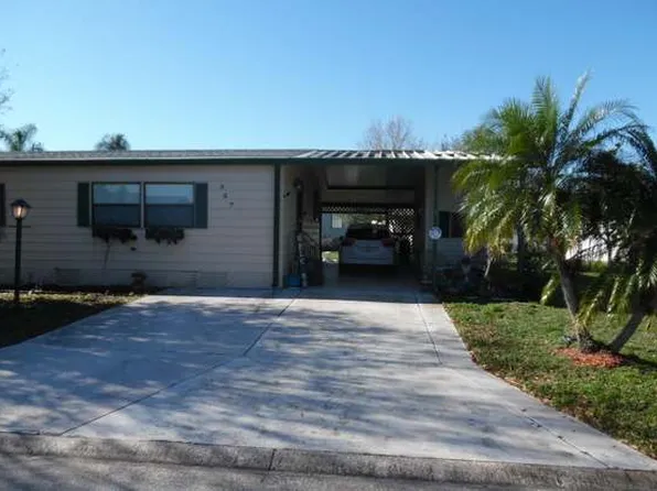 327 Macadamia Dr, Barefoot Bay, FL 32976