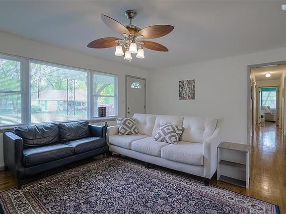 Bright, open and roomy! These hardwoods have been hidden under a carpet for years, and just recently became uncovered to show off their beauty! Hardwoods throughout.